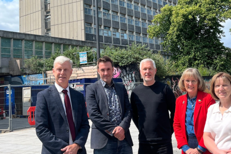 Four people stood in front of the Civic Centre