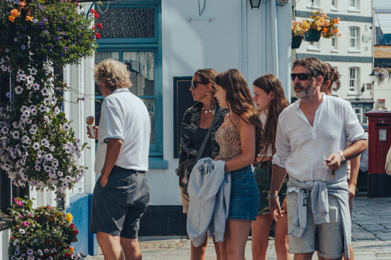 People looking into shops on The Barbican