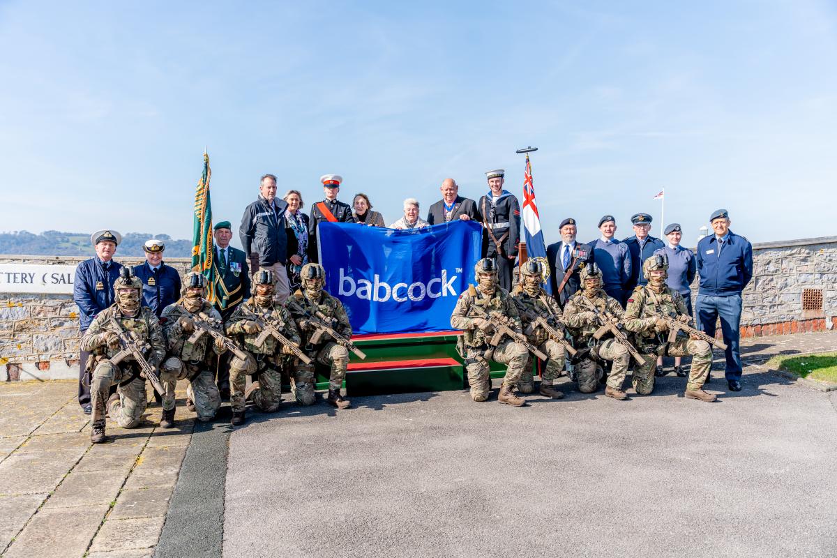 Members of the Armed Forces with the Babcock flag